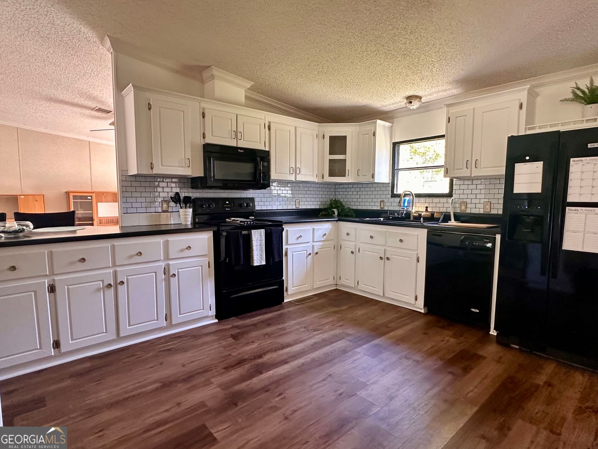 4 bedroom, 2 bathroom, 2,432 sq ft manufactured home,single family residence for sale at 293 Winding Way Drive, Jeffersonville, GA 31044 — photo 5