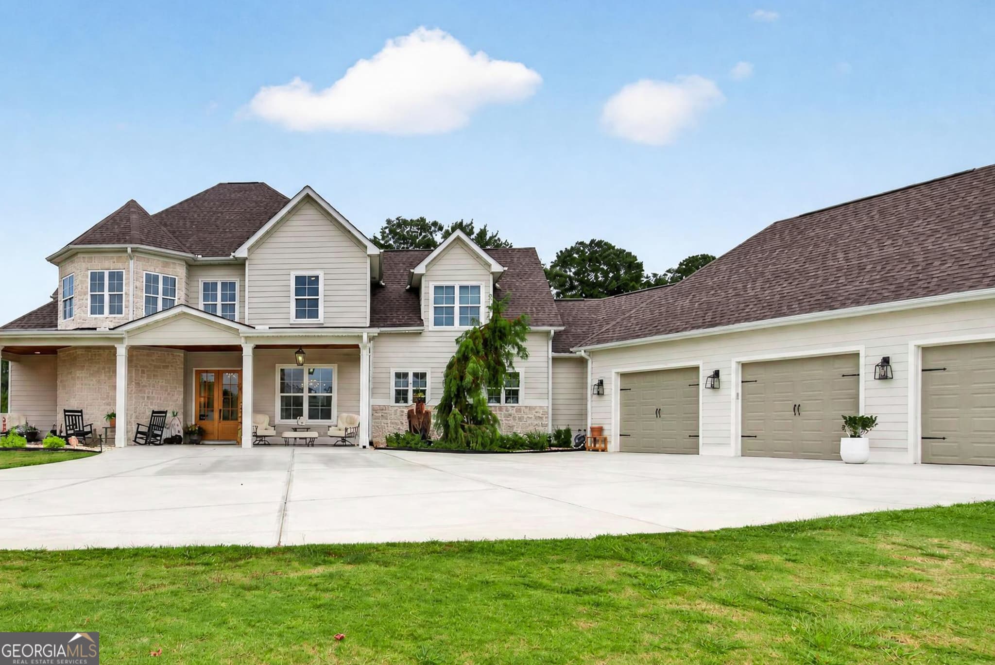 4 bedroom, 4.5 bathroom, 3,850 sq ft single family residence for sale at 124 John C Hunter Road, Sharpsburg, GA 30277 — photo 2