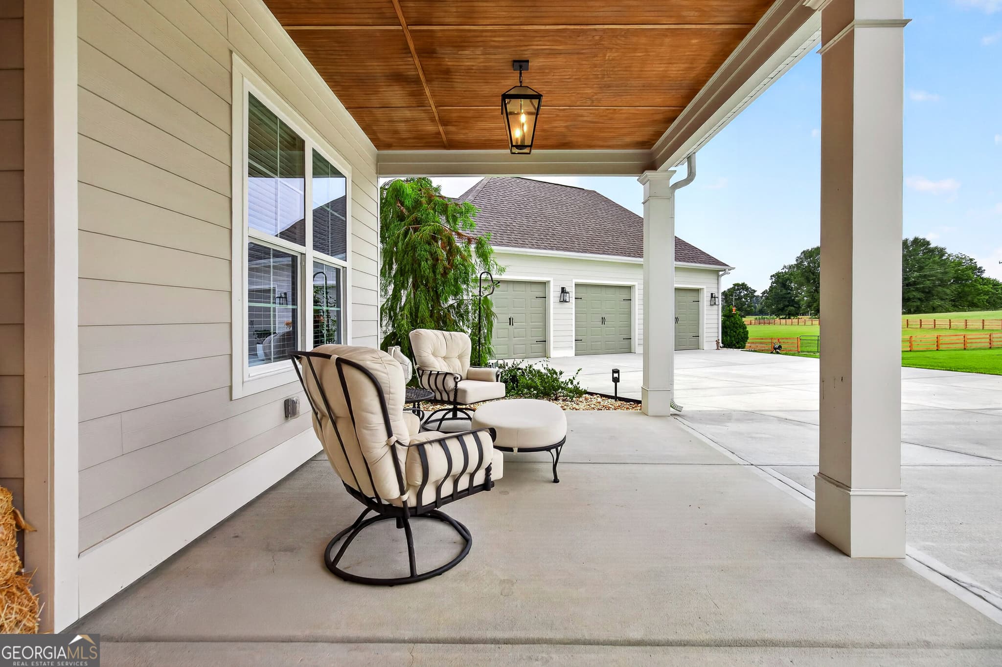 4 bedroom, 4.5 bathroom, 3,850 sq ft single family residence for sale at 124 John C Hunter Road, Sharpsburg, GA 30277 — photo 7