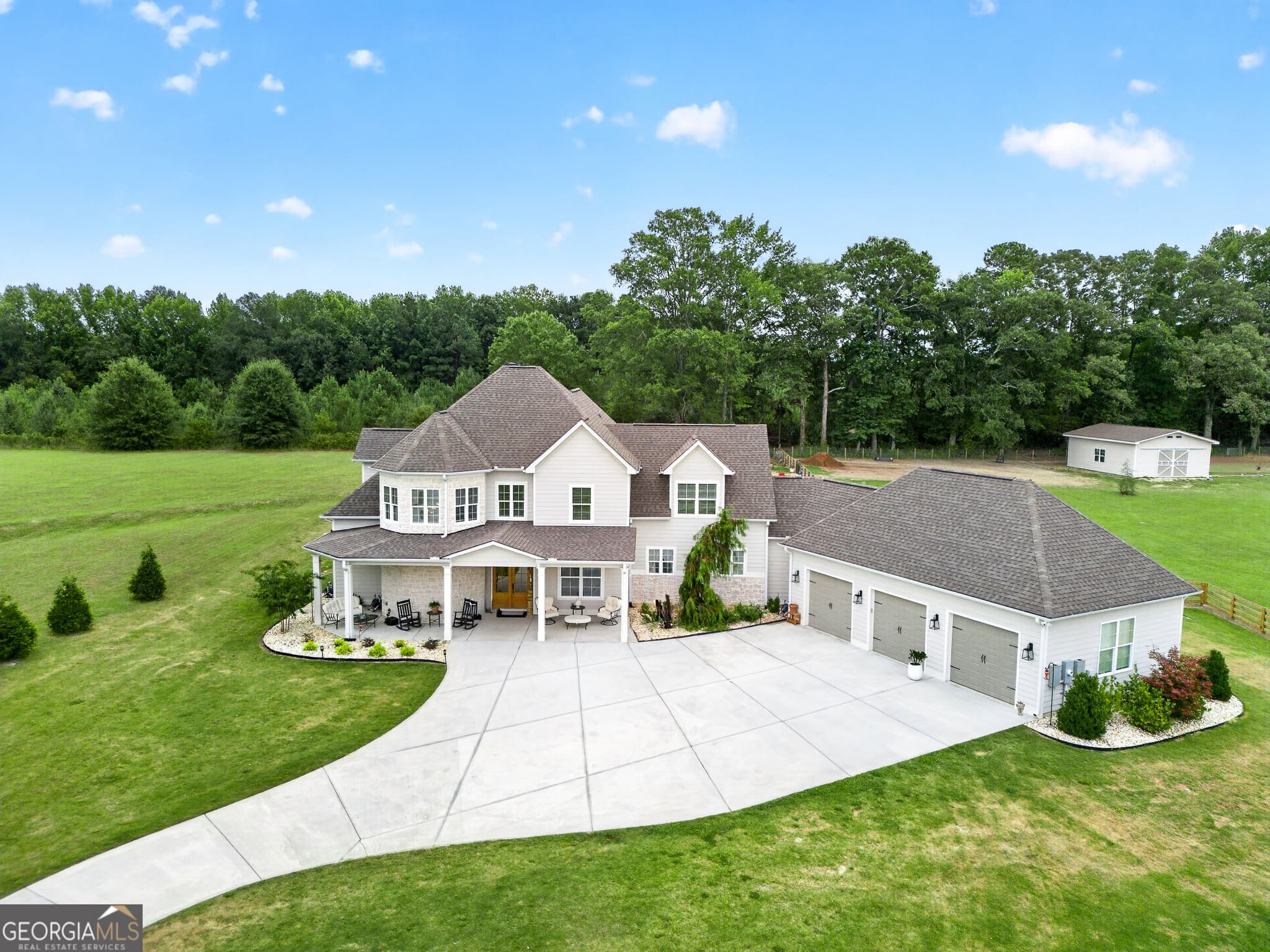 4 bedroom, 4.5 bathroom, 3,850 sq ft single family residence for sale at 124 John C Hunter Road, Sharpsburg, GA 30277 — photo 3