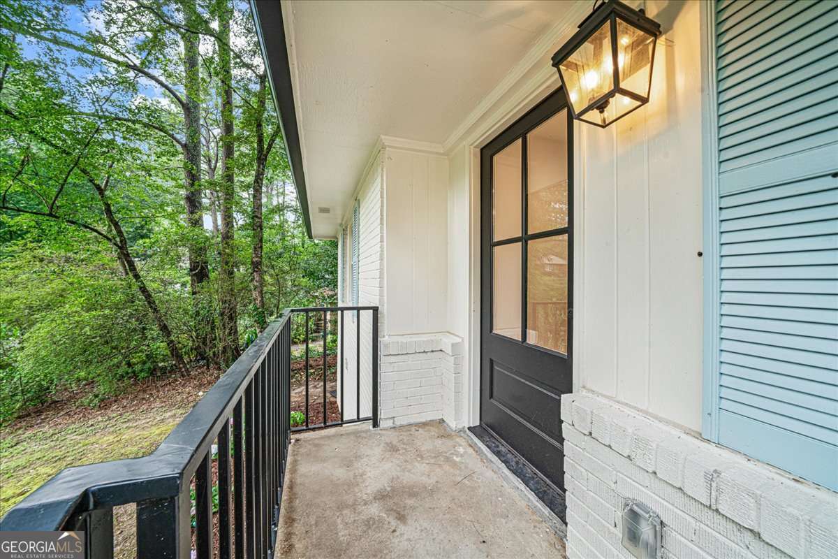 3 bedroom, 2 bathroom, 1,526 sq ft single family residence for sale at 1875 Ravenwood Way, Atlanta, GA 30329 — photo 2
