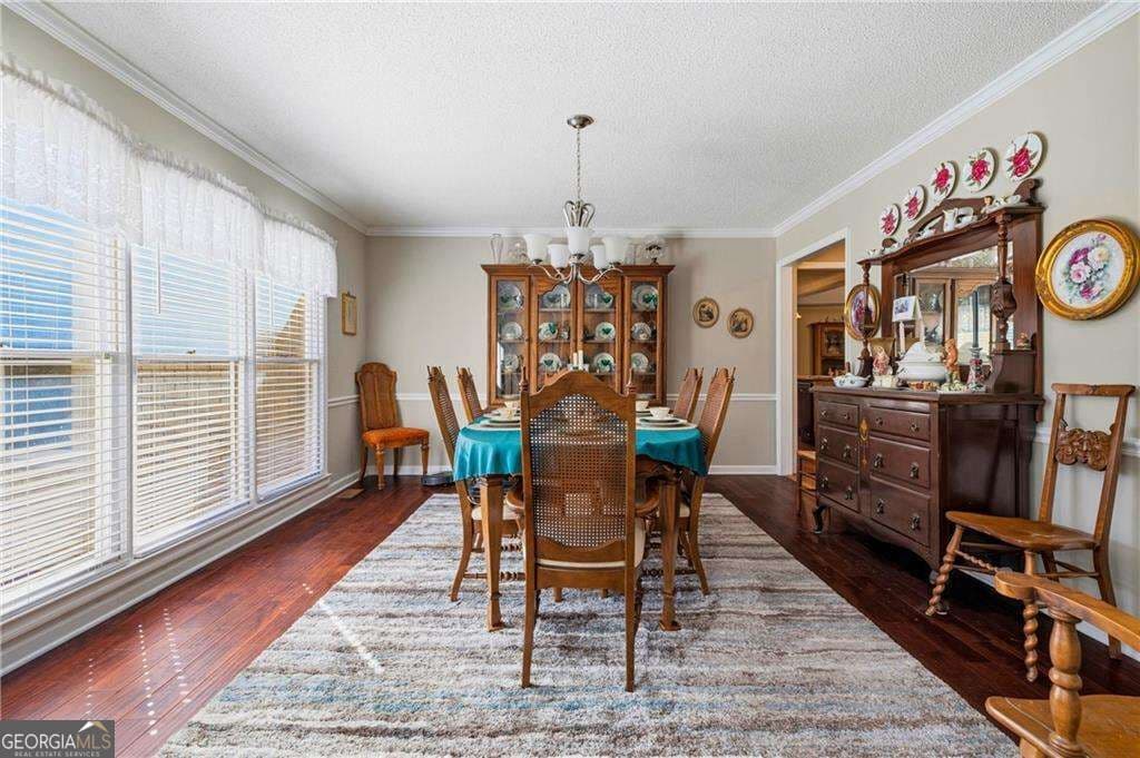 5 bedroom, 4 bathroom, 4,890 sq ft single family residence for sale at 609 Apache Trail, Woodstock, GA 30189 — photo 5