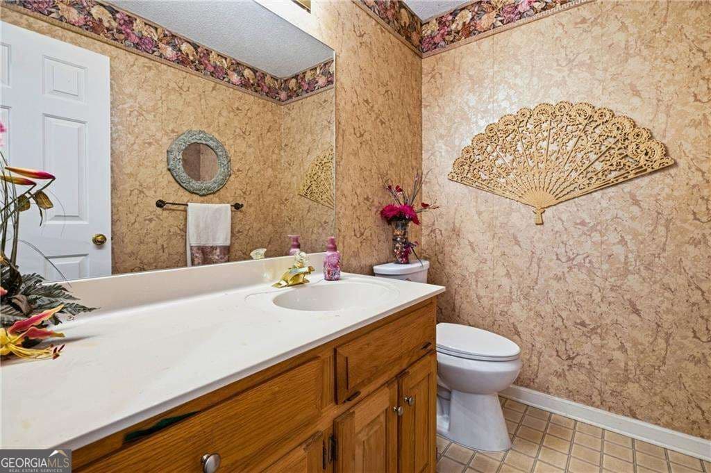 5 bedroom, 4 bathroom, 4,890 sq ft single family residence for sale at 609 Apache Trail, Woodstock, GA 30189 — photo 10
