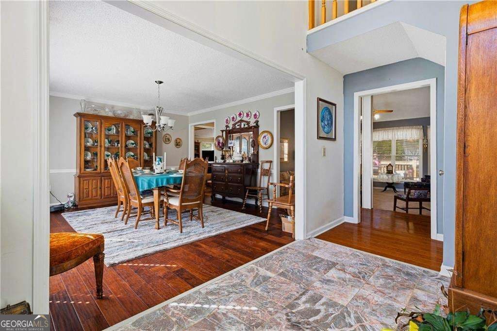 5 bedroom, 4 bathroom, 4,890 sq ft single family residence for sale at 609 Apache Trail, Woodstock, GA 30189 — photo 4