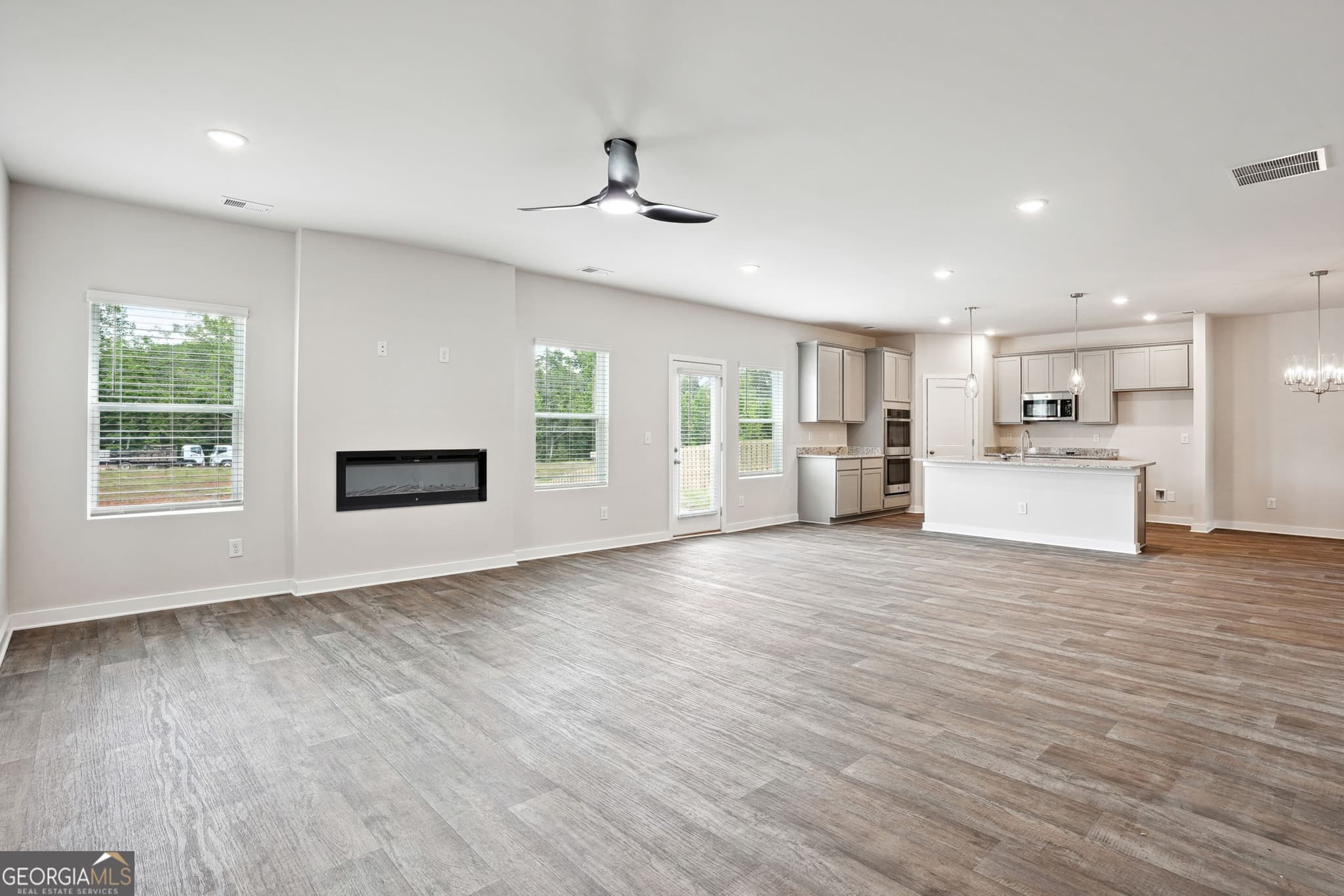4 bedroom, 2.5 bathroom, 2,700 sq ft single family residence for sale at 364 Jarrett Street, Fairburn, GA 30213 — photo 3
