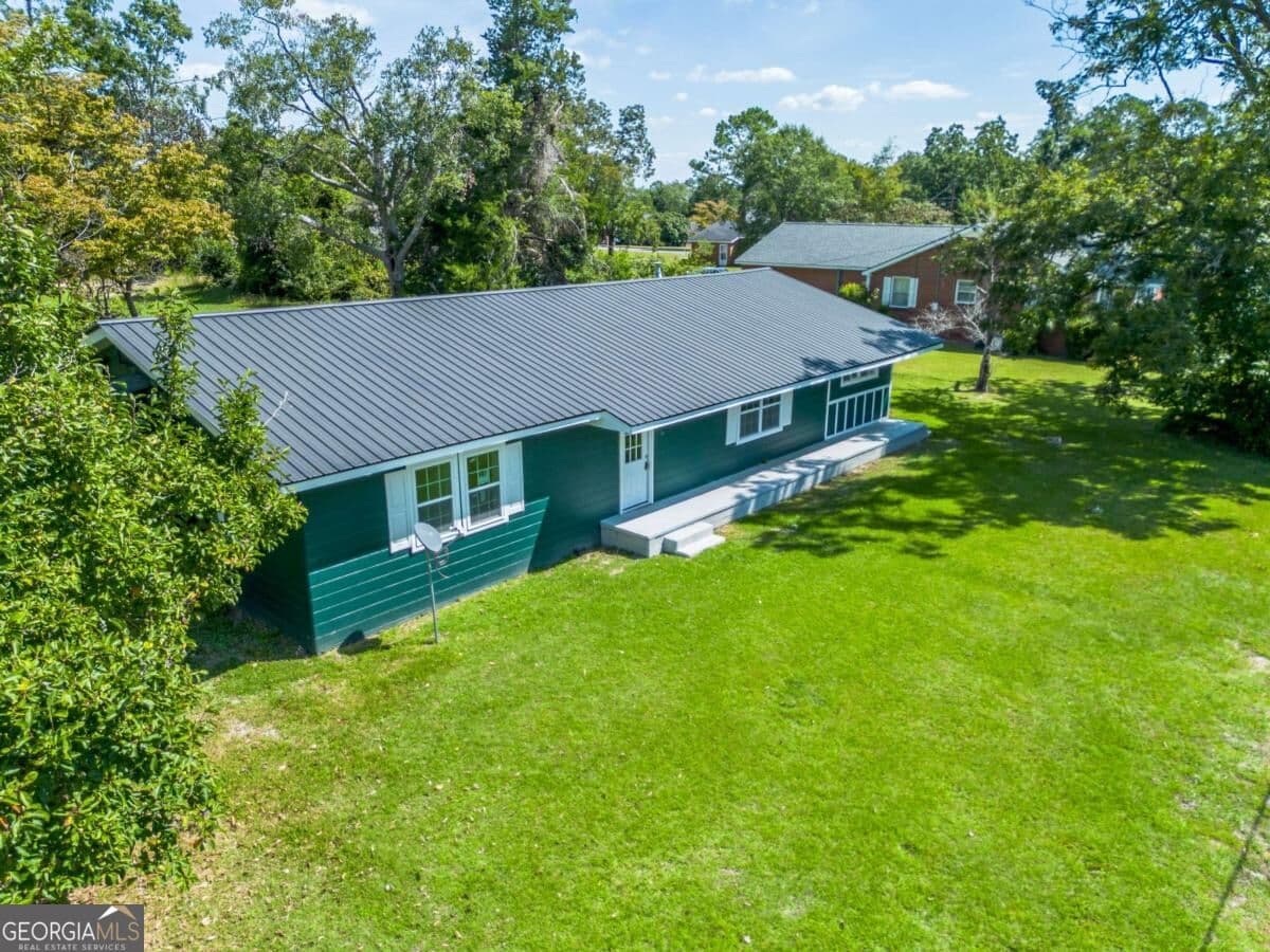 4 bedroom, 2 bathroom, 2,042 sq ft single family residence for sale at 210 W Graham Street, Mcrae-Helena, GA 31055