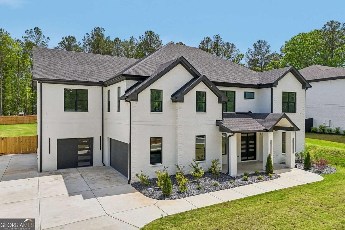5 bedroom, 4.5 bathroom, 5,189 sq ft single family residence for sale at 2592 Camp Mitchell Road LOT 3, Grayson, GA 30017 — photo 2
