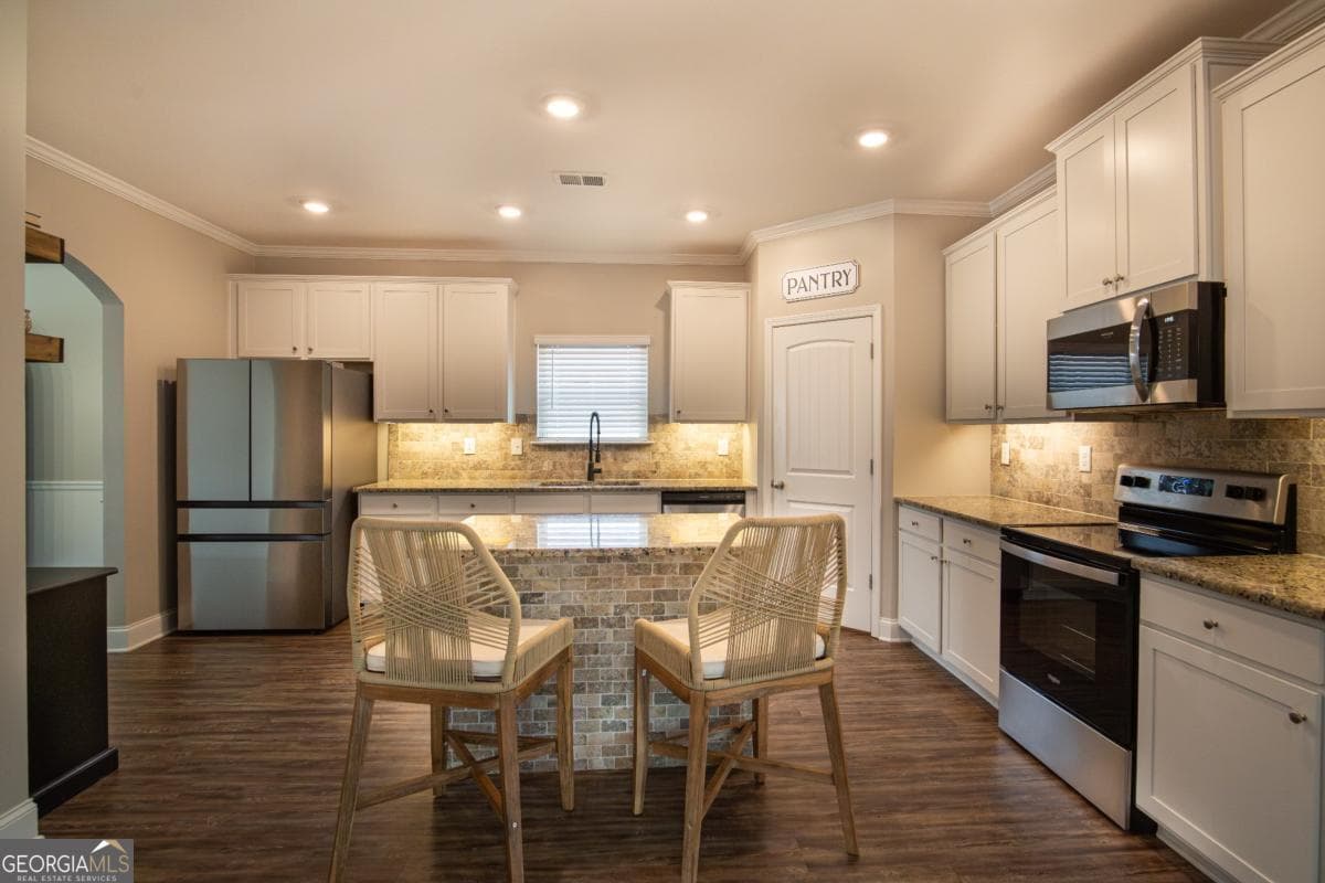 5 bedroom, 3.5 bathroom, 3,600 sq ft single family residence for sale at 36 NE Thunderhawk Lane, Rydal, GA 30171 — photo 9