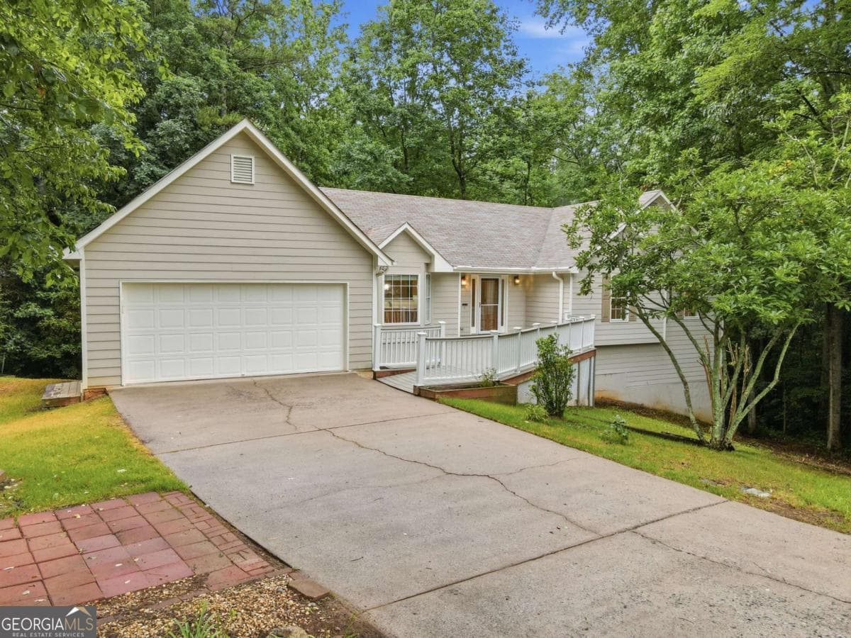 5 bedroom, 3 bathroom single family residence sold at 7035 Crossview Drive, Cumming, GA 30041