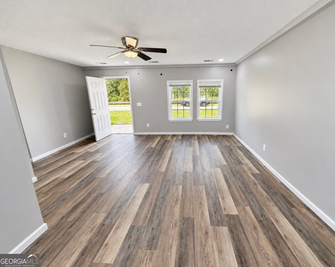 4 bedroom, 2 bathroom, 1,176 sq ft single family residence for sale at 177 W Brazell Street, Reidsville, GA 30453 — photo 2