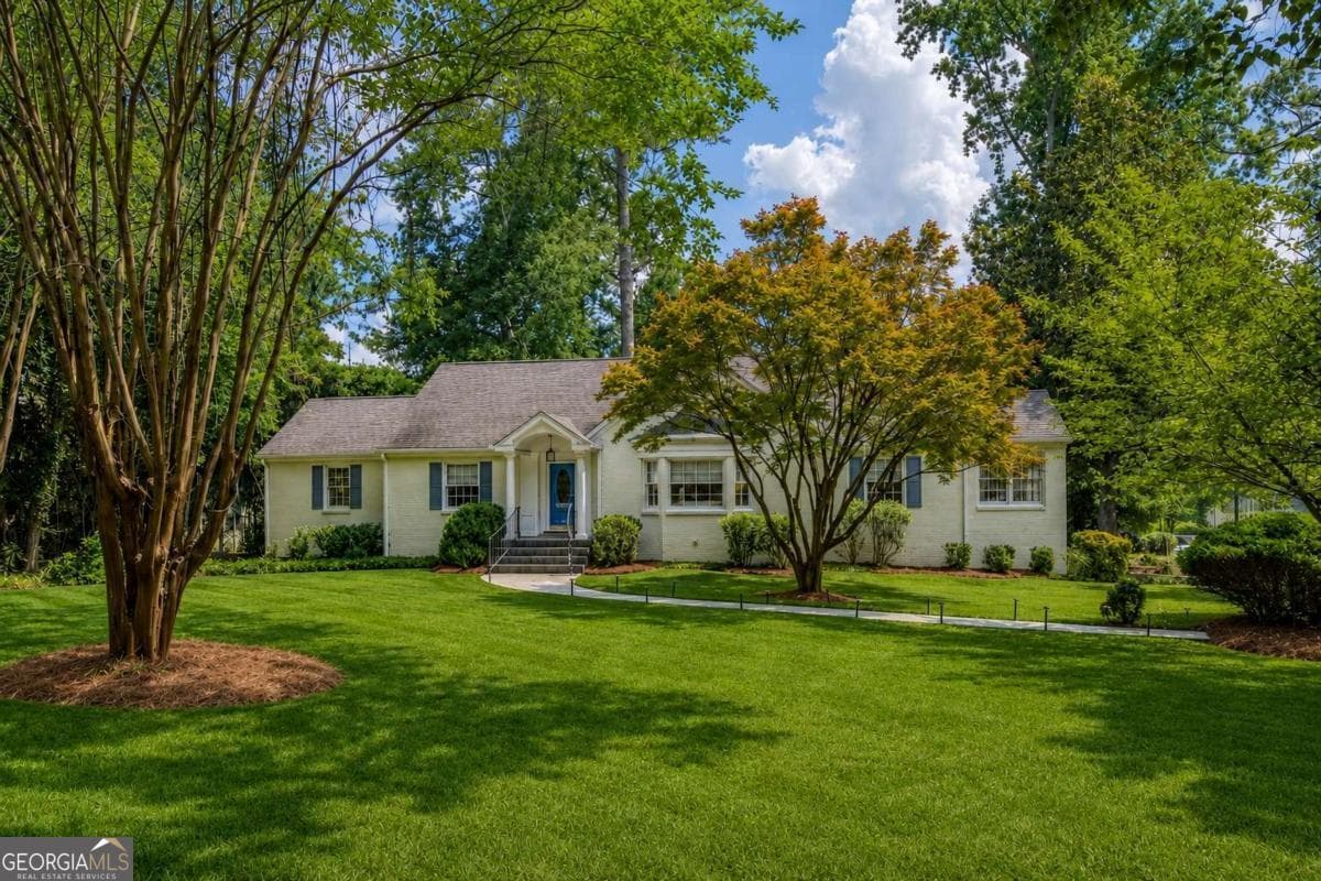 4 bedroom, 3 bathroom, 4,765 sq ft single family residence for sale at 1250 Oakdale Road, Atlanta, GA 30307