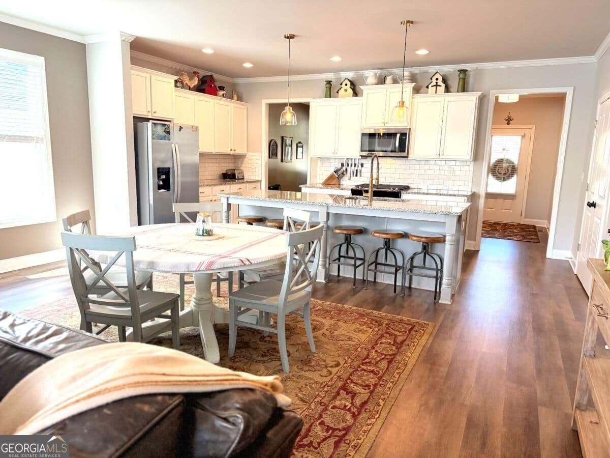 6 bedroom, 4 bathroom, 4,029 sq ft single family residence for sale at 4017 Windsor Trail, Gainesville, GA 30506 — photo 5
