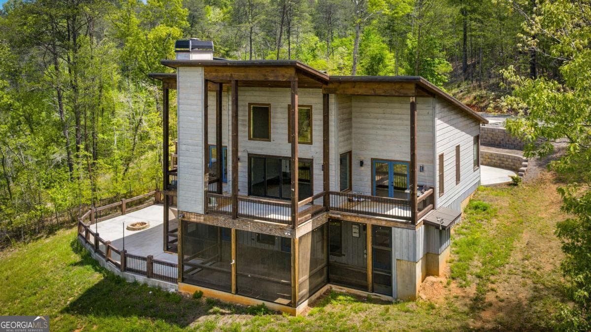 5 bedroom, 3 bathroom, 3,248 sq ft cabin,single family residence sold at 670 River Hill Road, Mineral Bluff, GA 30559