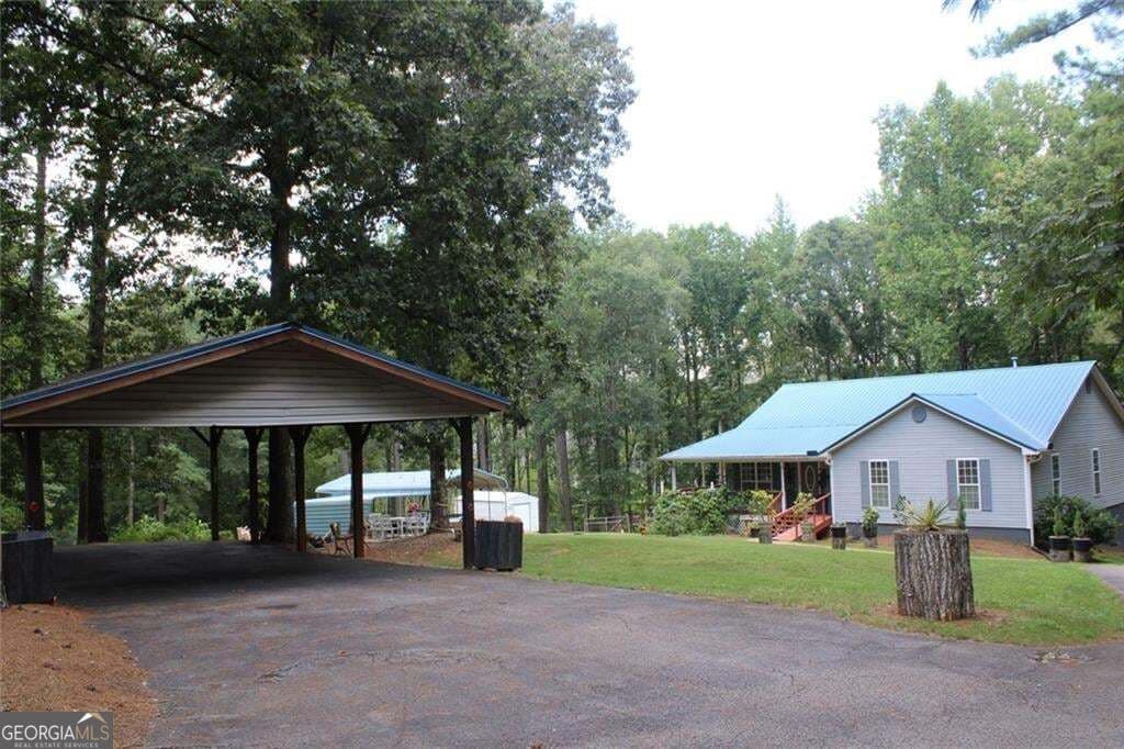 3 bedroom, 2.5 bathroom, 3,788 sq ft single family residence for sale at 1145 Jackson Lake Road, Jackson, GA 30233 — photo 6