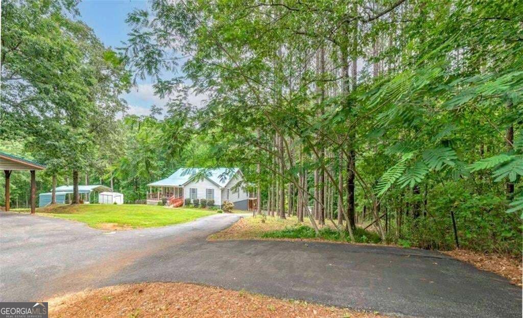 3 bedroom, 2.5 bathroom, 3,788 sq ft single family residence for sale at 1145 Jackson Lake Road, Jackson, GA 30233 — photo 5