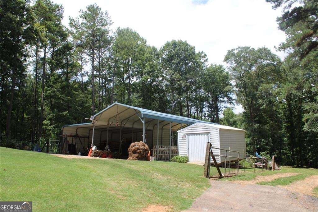 3 bedroom, 2.5 bathroom, 3,788 sq ft single family residence for sale at 1145 Jackson Lake Road, Jackson, GA 30233 — photo 10