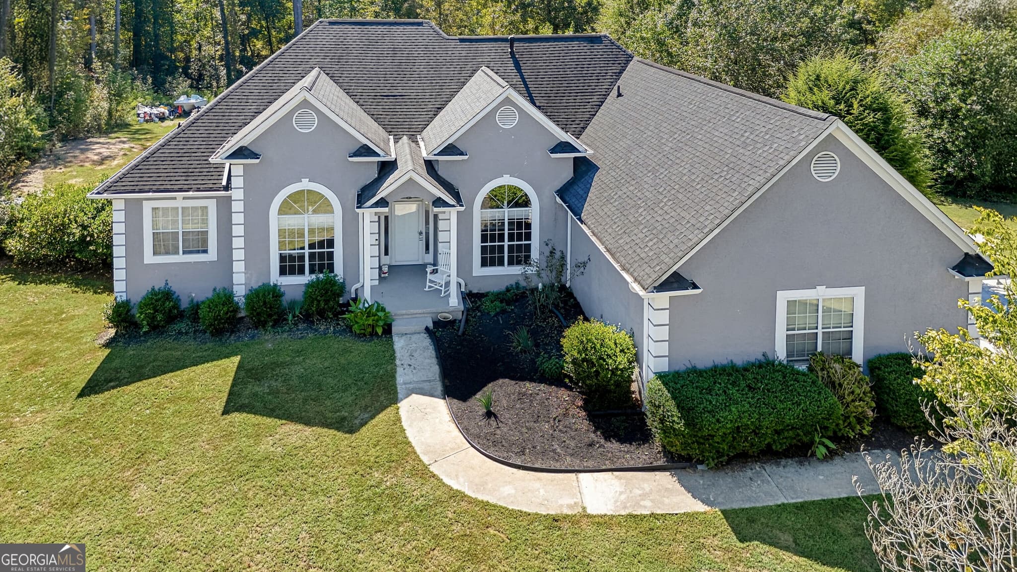 6 bedroom, 3 bathroom, 6,150 sq ft single family residence for sale at 12136 Edgewater Drive, Hampton, GA 30228 — photo 2