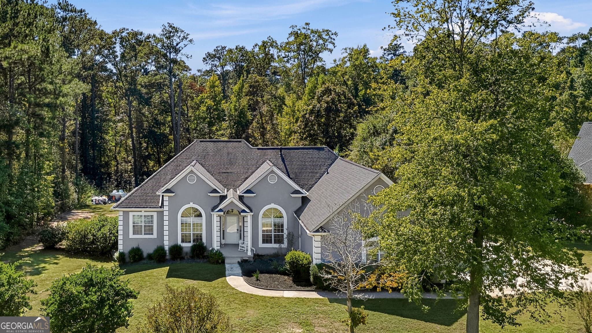 6 bedroom, 3 bathroom, 6,150 sq ft single family residence for sale at 12136 Edgewater Drive, Hampton, GA 30228 — photo 3