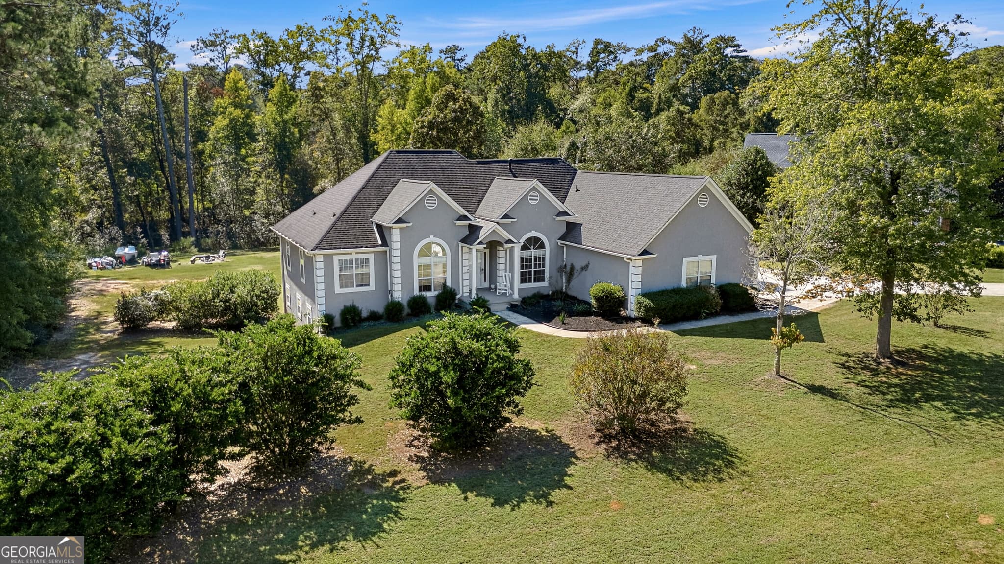 6 bedroom, 3 bathroom, 6,150 sq ft single family residence for sale at 12136 Edgewater Drive, Hampton, GA 30228 — photo 5
