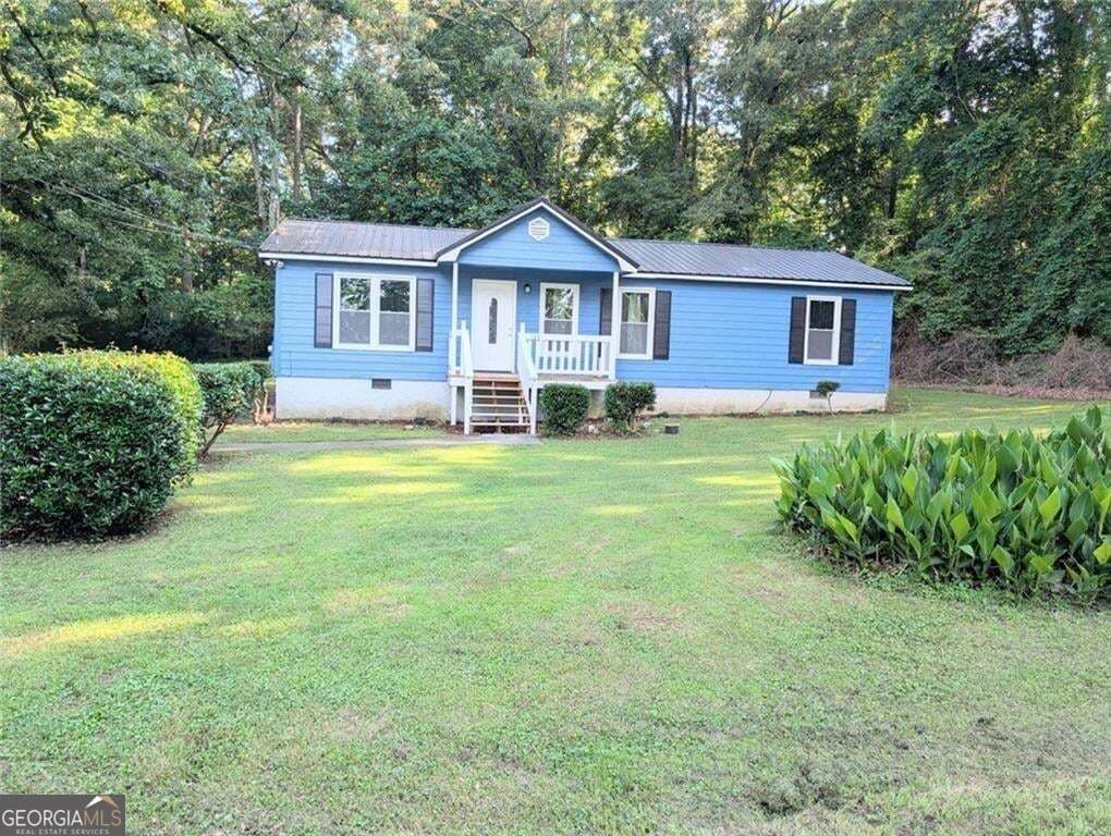 3 bedroom, 2 bathroom, 1,152 sq ft single family residence for sale at 145 Knob Drive, Carrollton, GA 30116 — photo 2
