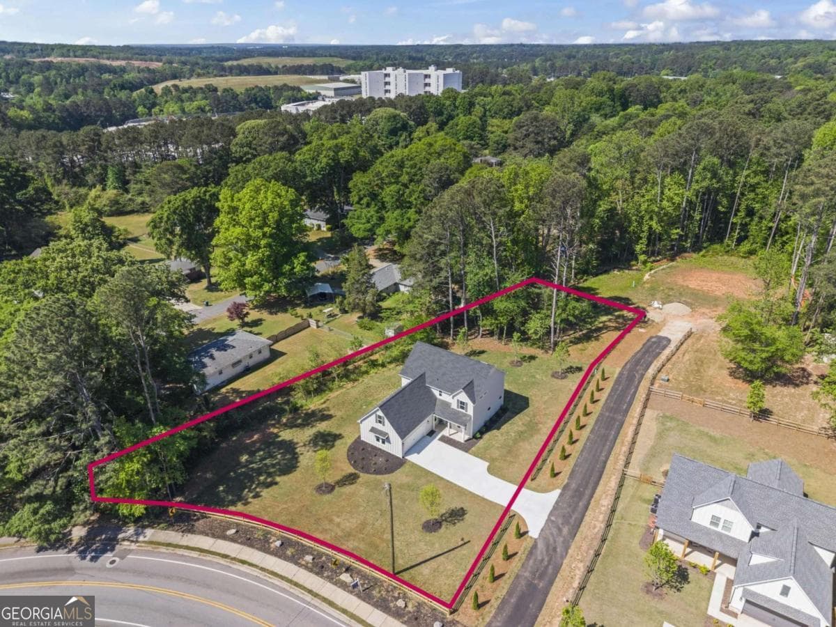 4 bedroom, 3 bathroom single family residence sold at 1706 Cunningham Road, Marietta, GA 30008