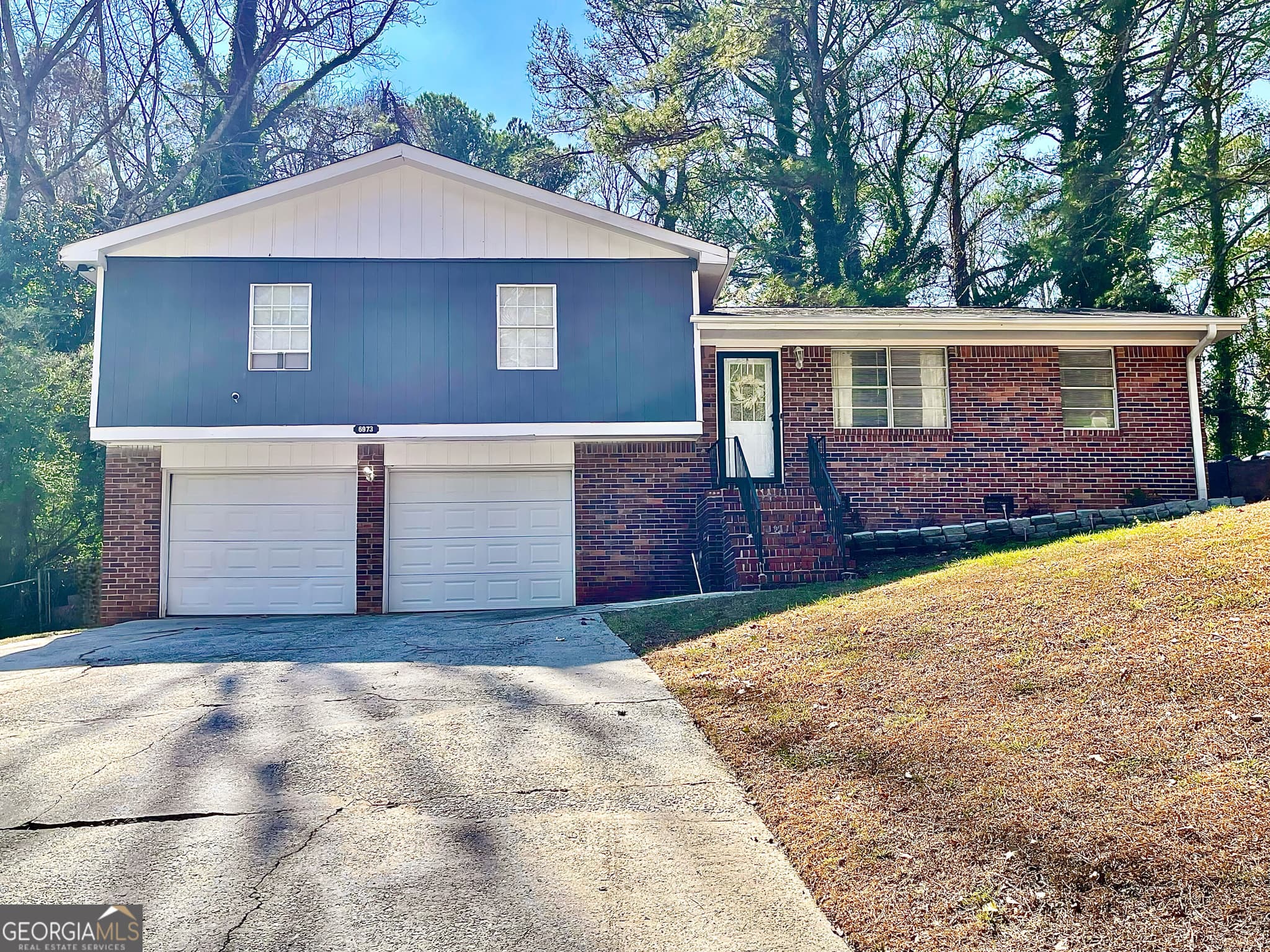 3 bedroom, 2 bathroom single family residence for rent at 6973 Kimberland Gardens Lane, Lithonia, GA 30058 for $2,000 a month — photo 1 of 11