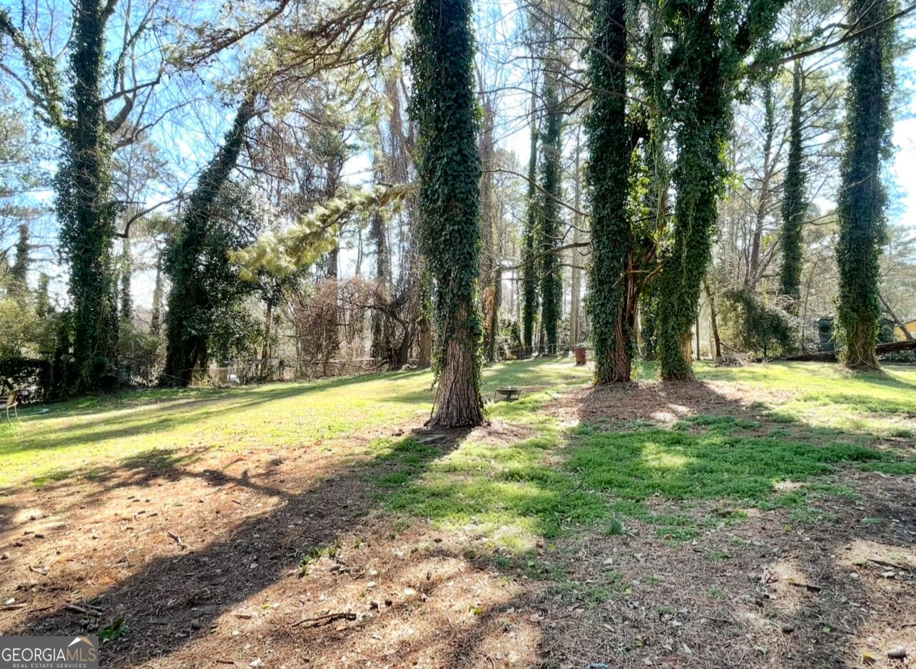 3 bedroom, 2 bathroom single family residence for rent at 6973 Kimberland Gardens Lane, Lithonia, GA 30058 for $2,000 a month — photo 10