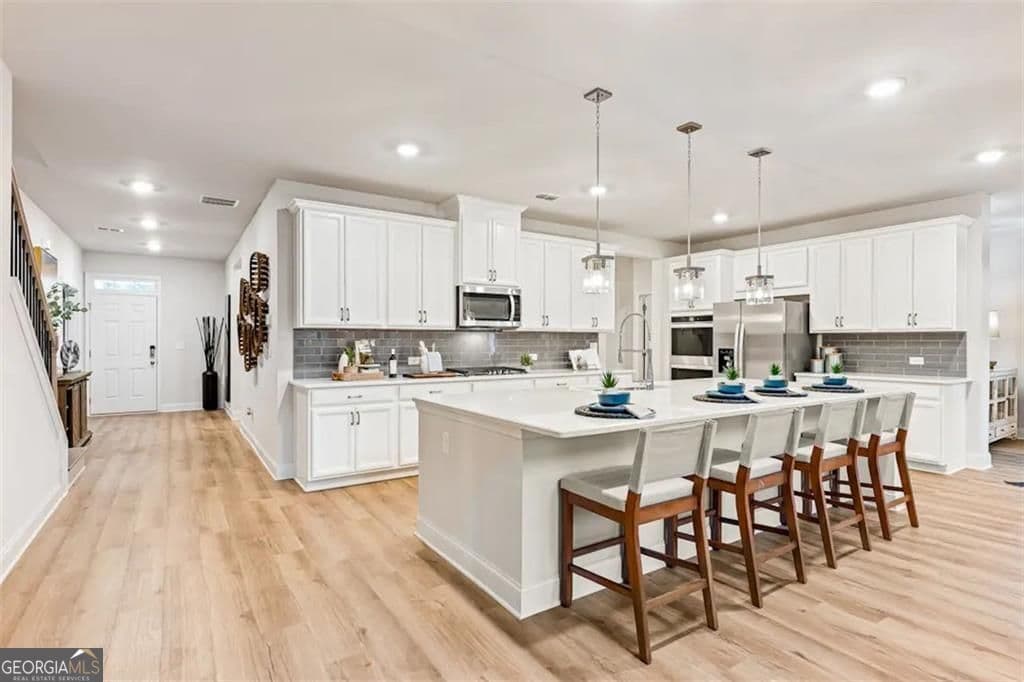 6 bedroom, 5.5 bathroom, 3,892 sq ft single family residence for sale at 344 Bailiwick Lane, Canton, GA 30115 — photo 4