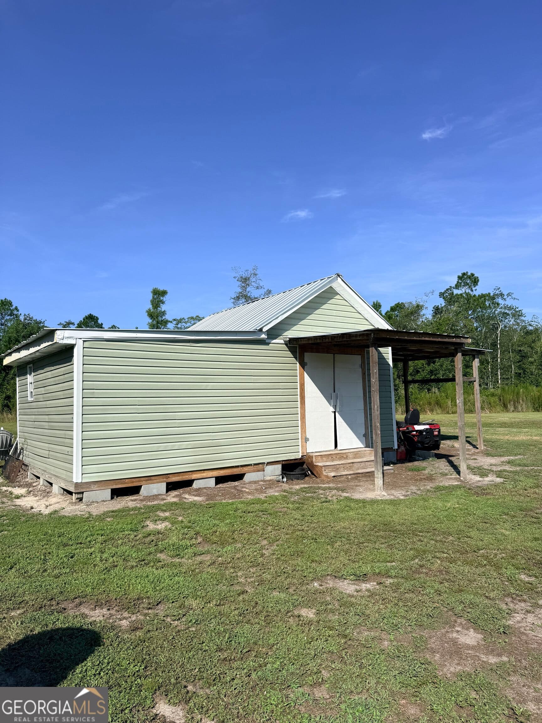 4 bedroom, 3 bathroom, 2,560 sq ft manufactured home,single family residence for sale at 4493 Nails Ferry Road, Baxley, GA 31513 — photo 7