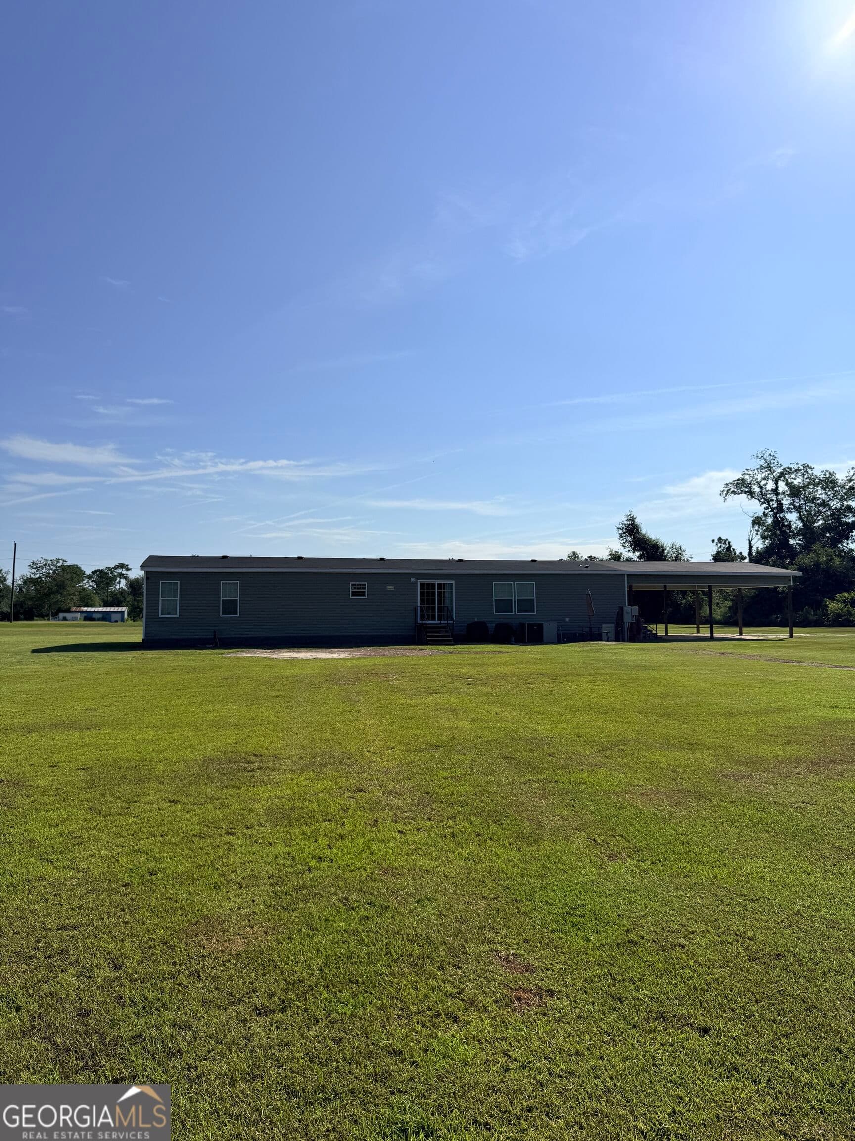 4 bedroom, 3 bathroom, 2,560 sq ft manufactured home,single family residence for sale at 4493 Nails Ferry Road, Baxley, GA 31513 — photo 4