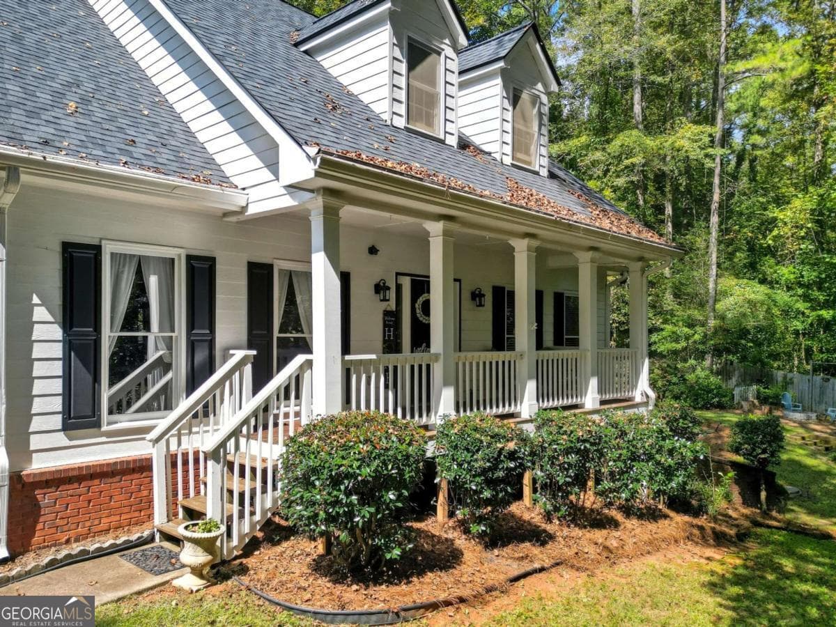 7 bedroom, 3.5 bathroom, 4,400 sq ft single family residence for sale at 5090 Eubanks Road, Woodstock, GA 30188 — photo 2