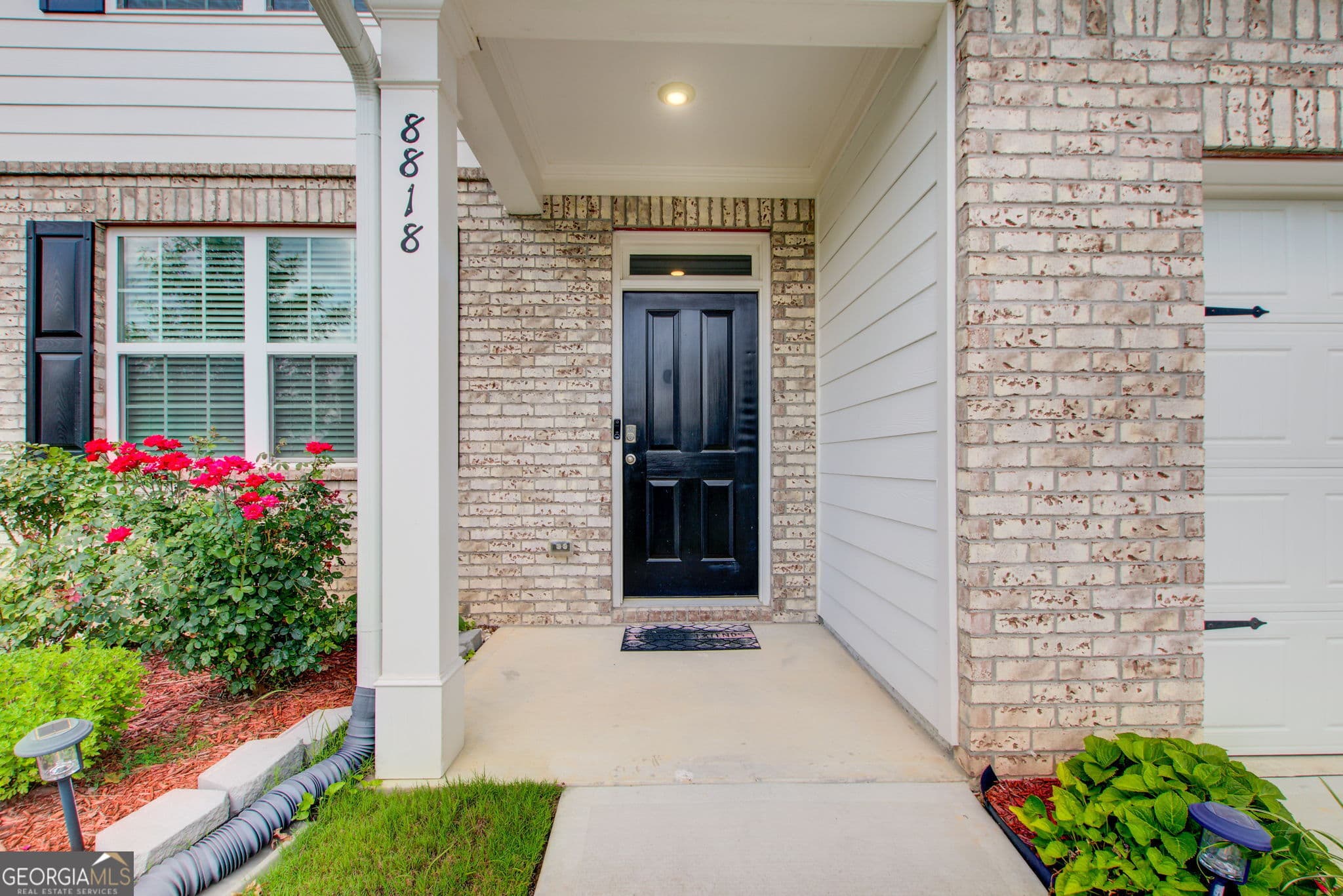 5 bedroom, 3 bathroom, 2,556 sq ft single family residence for sale at 8818 Sibella Court, Lithia Springs, GA 30122 — photo 2
