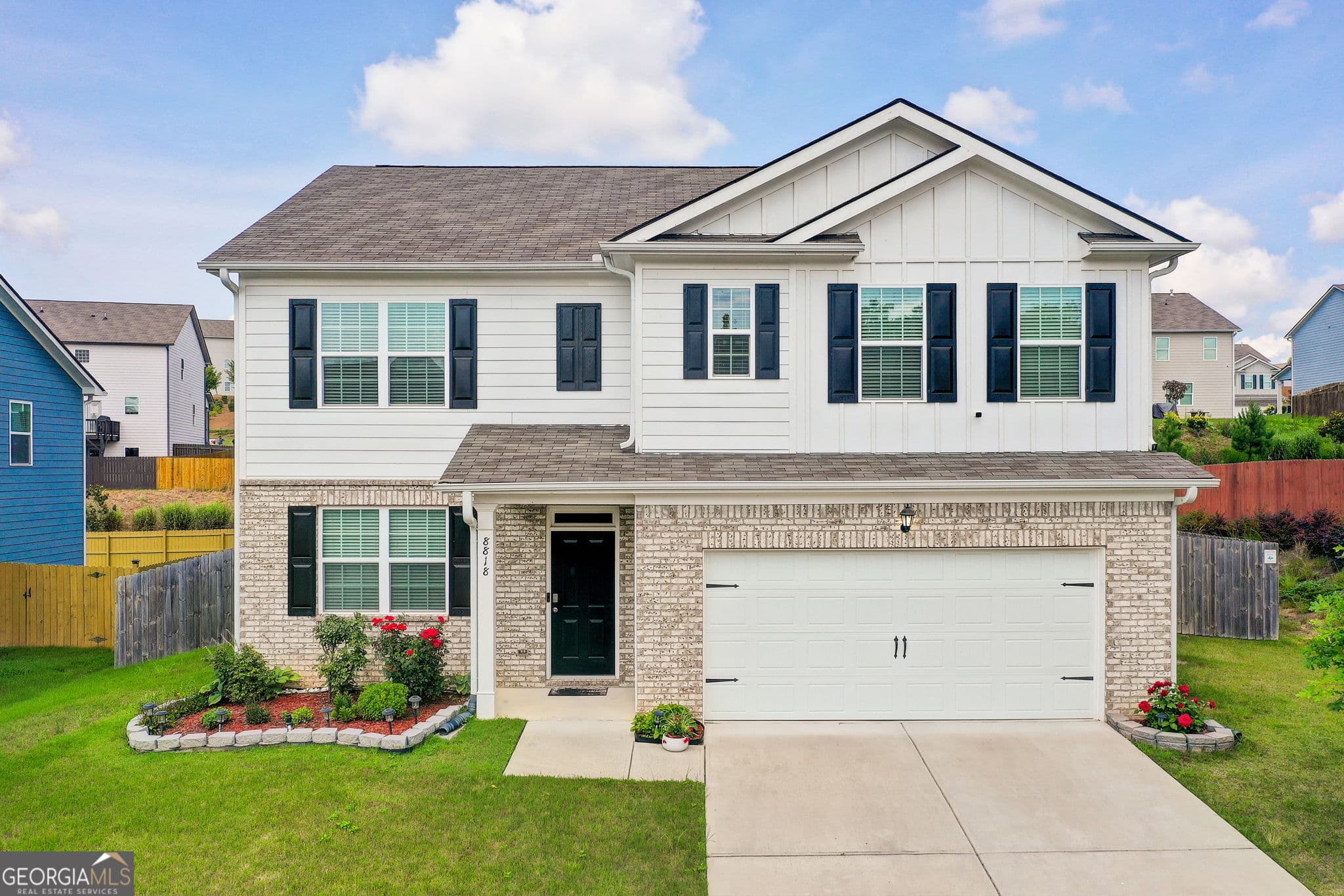 5 bedroom, 3 bathroom, 2,556 sq ft single family residence for sale at 8818 Sibella Court, Lithia Springs, GA 30122 — photo 1 of 36