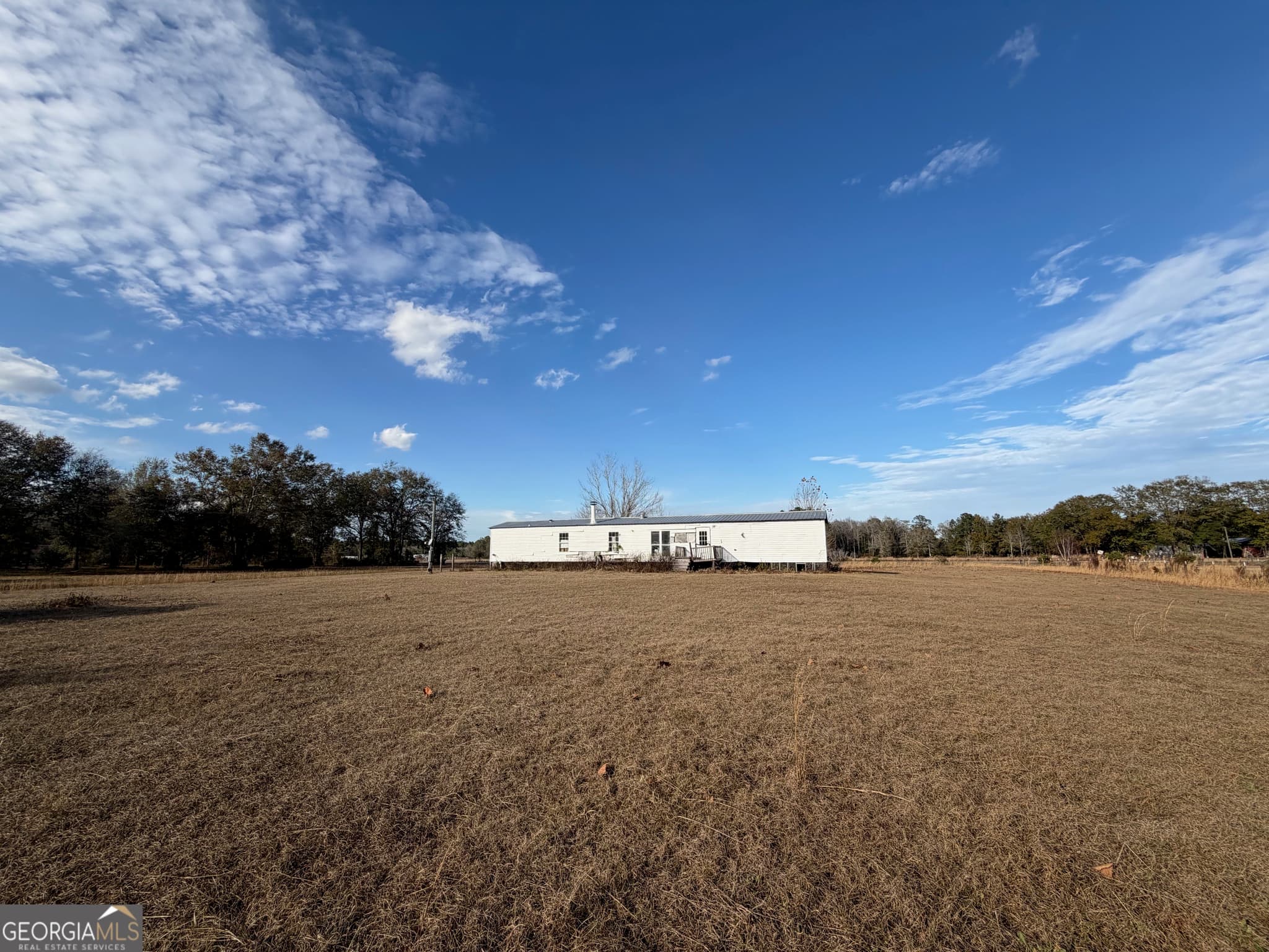 3 bedroom, 2 bathroom, 1,064 sq ft manufactured home,mixed use for sale at 1180 Farm Road, St. George, GA 31562 — photo 2