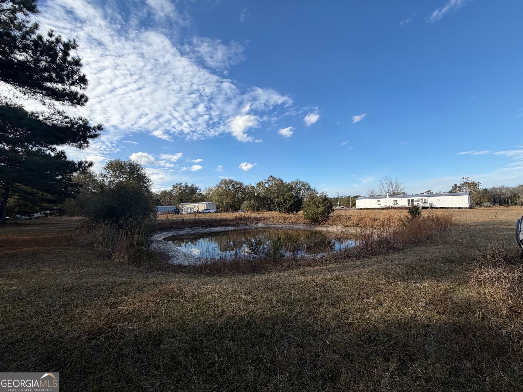3 bedroom, 2 bathroom, 1,064 sq ft manufactured home,mixed use for sale at 1180 Farm Road, St. George, GA 31562 — photo 5