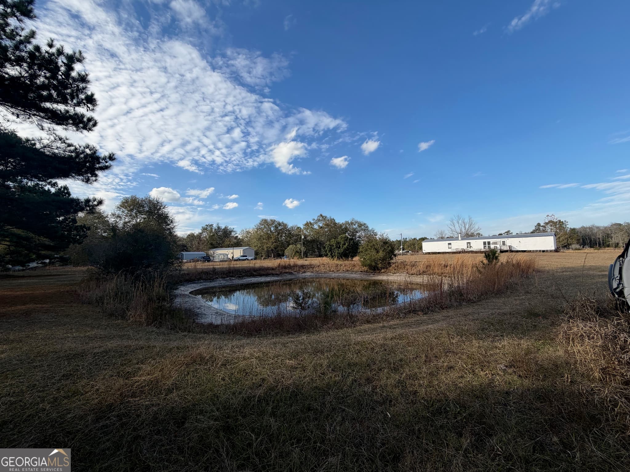 3 bedroom, 2 bathroom, 1,064 sq ft manufactured home,mixed use for sale at 1180 Farm Road, St. George, GA 31562 — photo 4