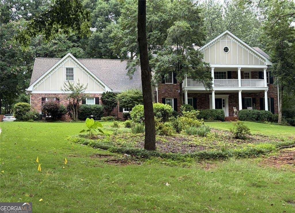 5 bedroom, 5.5 bathroom, 6,788 sq ft single family residence for sale at 5616 Silver Ridge Drive, Smoke Rise, GA 30087 — photo 2