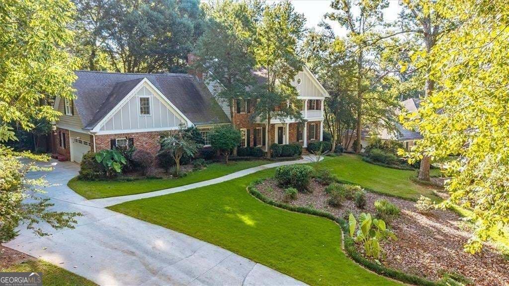 5 bedroom, 5.5 bathroom, 6,788 sq ft single family residence for sale at 5616 Silver Ridge Drive, Smoke Rise, GA 30087 — photo 3