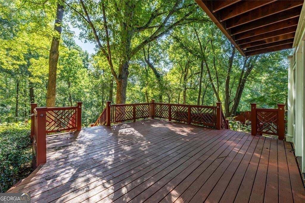 5 bedroom, 5.5 bathroom, 6,788 sq ft single family residence for sale at 5616 Silver Ridge Drive, Smoke Rise, GA 30087 — photo 5