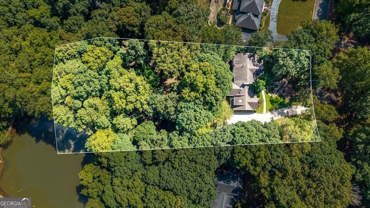 5 bedroom, 5.5 bathroom, 6,788 sq ft single family residence for sale at 5616 Silver Ridge Drive, Smoke Rise, GA 30087 — photo 9