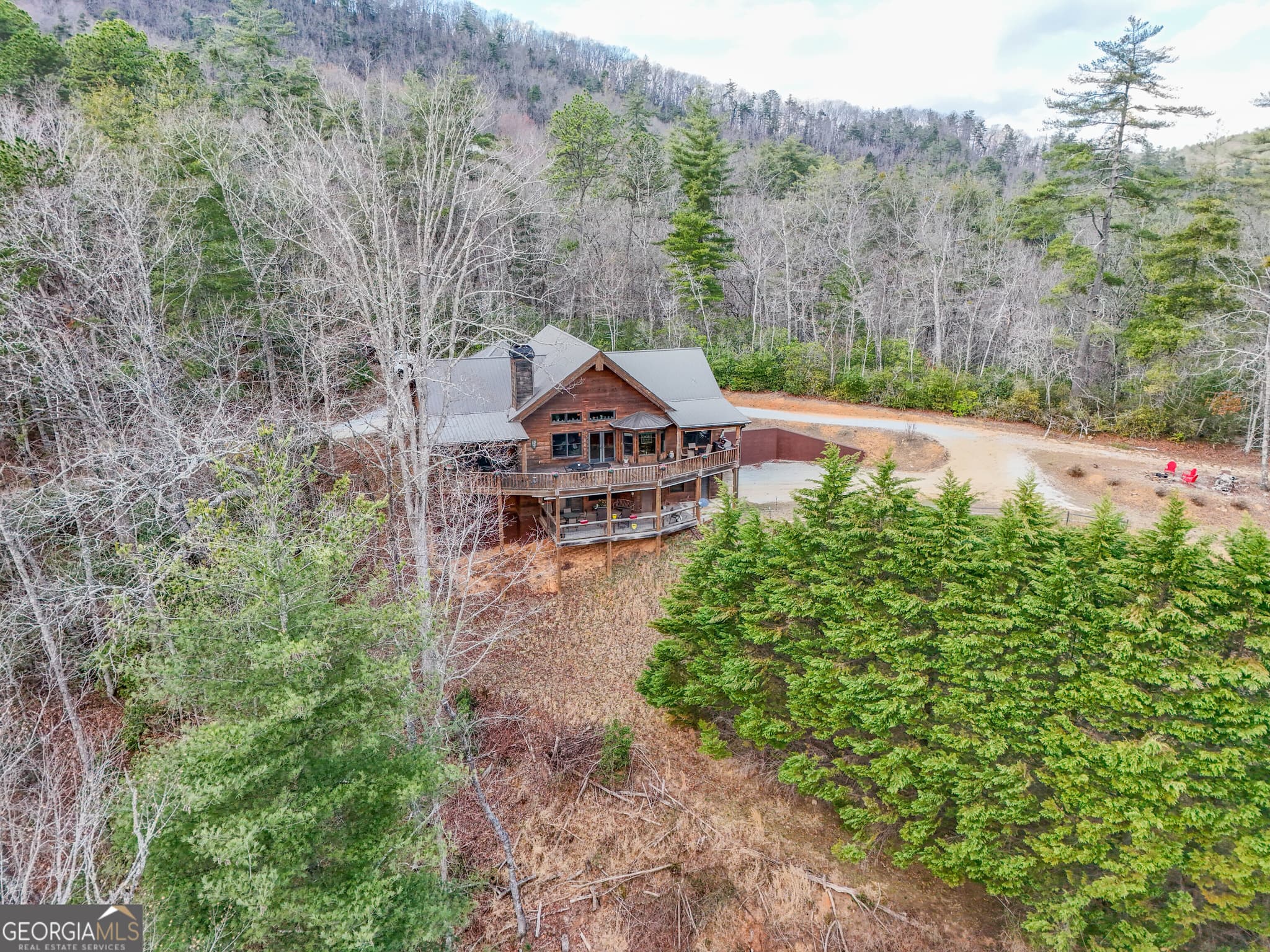4 bedroom, 3 bathroom, 4,136 sq ft cabin,single family residence for sale at 5232 CROW CREEK Road, Lakemont, GA 30552 — photo 2