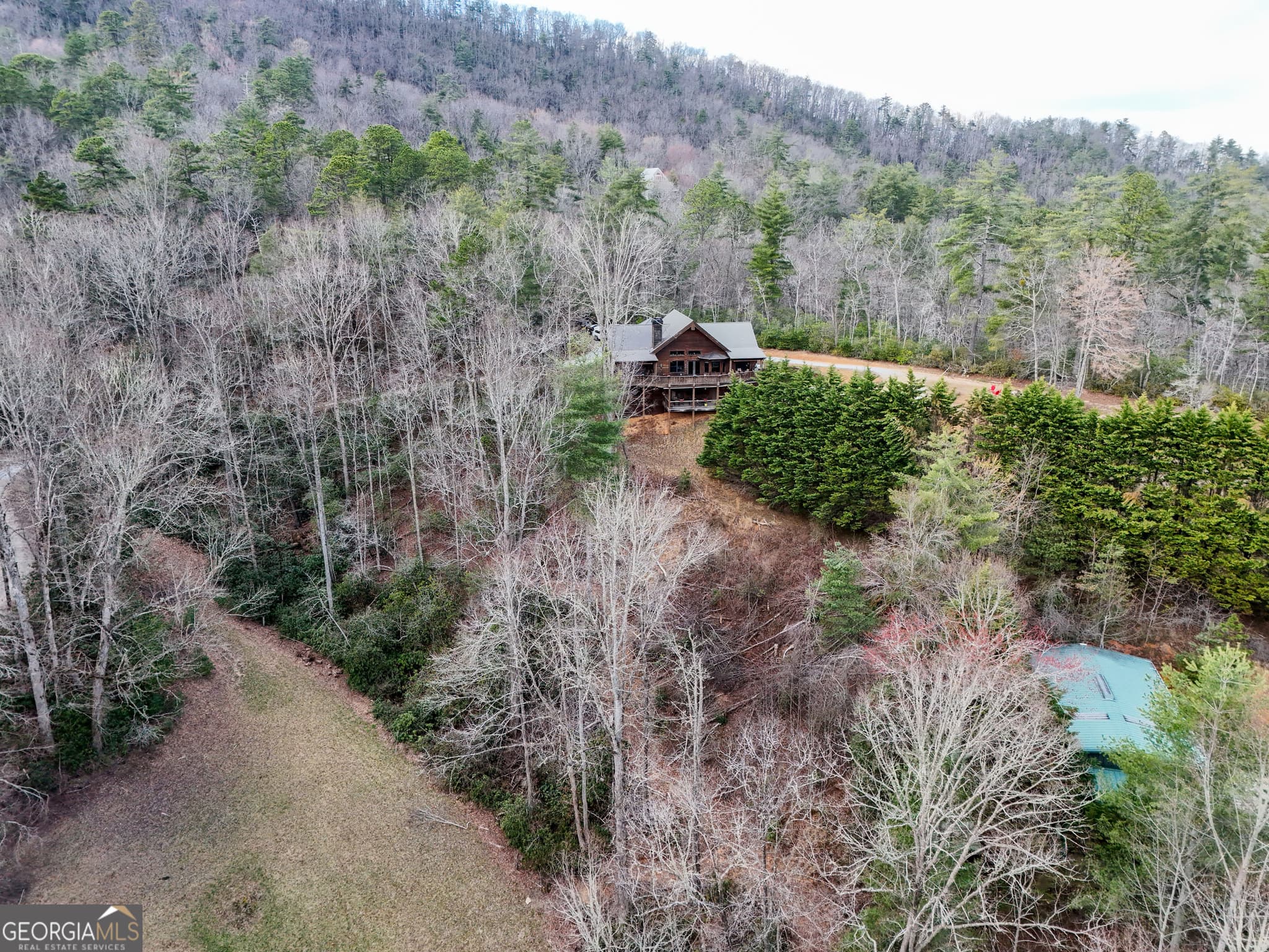 4 bedroom, 3 bathroom, 4,136 sq ft cabin,single family residence for sale at 5232 CROW CREEK Road, Lakemont, GA 30552 — photo 1 of 90