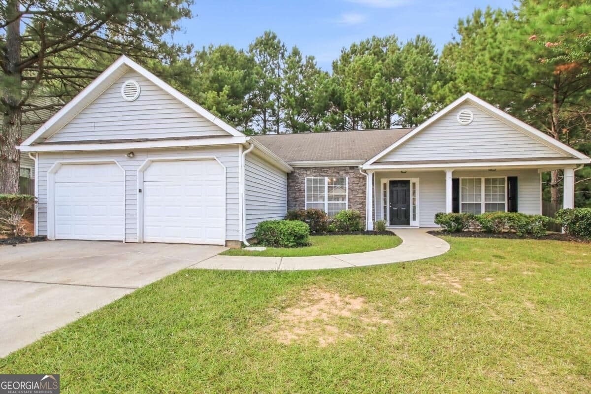 3 bedroom, 2 bathroom, 1,648 sq ft single family residence for sale at 1426 Hyde Court, Hampton, GA 30228 — photo 2