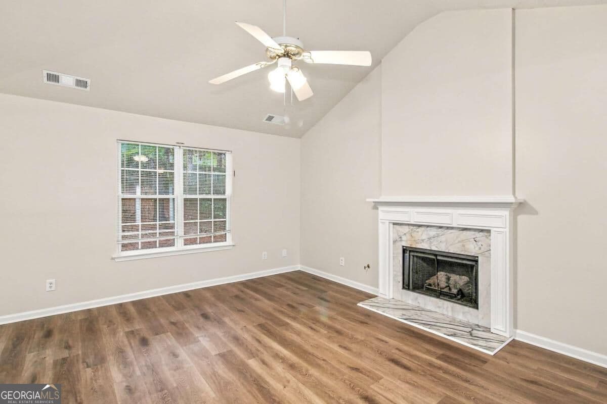 3 bedroom, 2 bathroom, 1,648 sq ft single family residence for sale at 1426 Hyde Court, Hampton, GA 30228 — photo 3