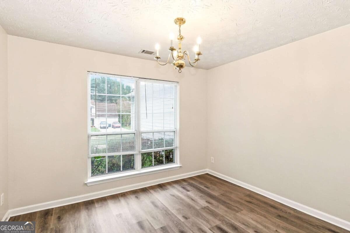 3 bedroom, 2 bathroom, 1,648 sq ft single family residence for sale at 1426 Hyde Court, Hampton, GA 30228 — photo 5