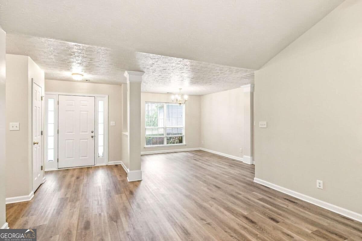 3 bedroom, 2 bathroom, 1,648 sq ft single family residence for sale at 1426 Hyde Court, Hampton, GA 30228 — photo 4
