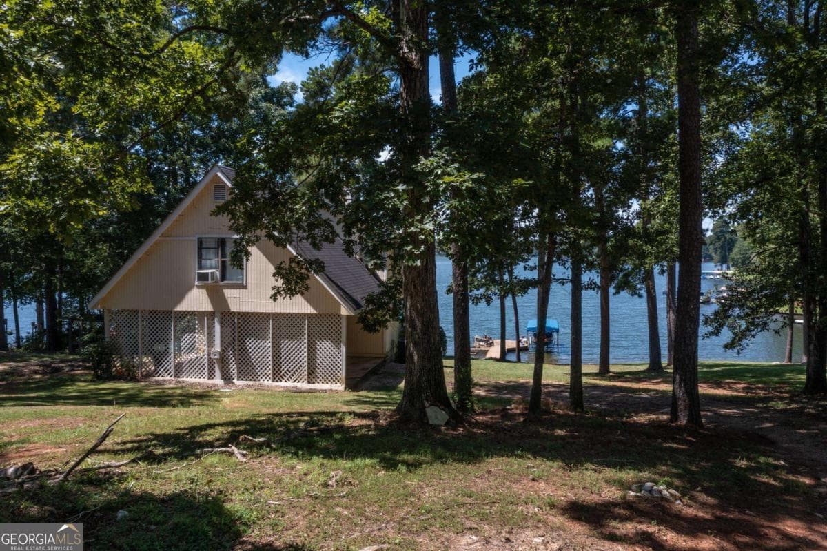 3 bedroom, 2 bathroom, 1,844 sq ft single family residence for sale at 1031 Hawks Bill Drive, Greensboro, GA 30642 — photo 1 of 41