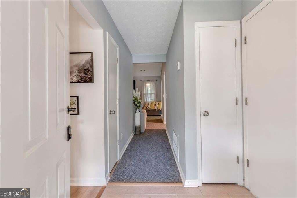 4 bedroom, 2 bathroom, 1,440 sq ft single family residence for sale at 2000 Wendover Drive, Snellville, GA 30078 — photo 2
