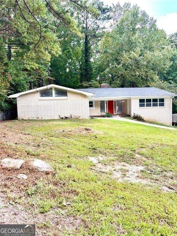 6 bedroom, 3 bathroom, 4,457 sq ft single family residence for sale at 2924 HANDY Drive, Atlanta, GA 30318 — photo 3