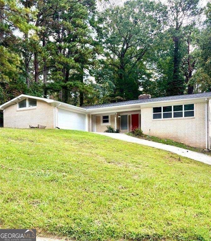 6 bedroom, 3 bathroom, 4,457 sq ft single family residence for sale at 2924 HANDY Drive, Atlanta, GA 30318 — photo 1 of 102